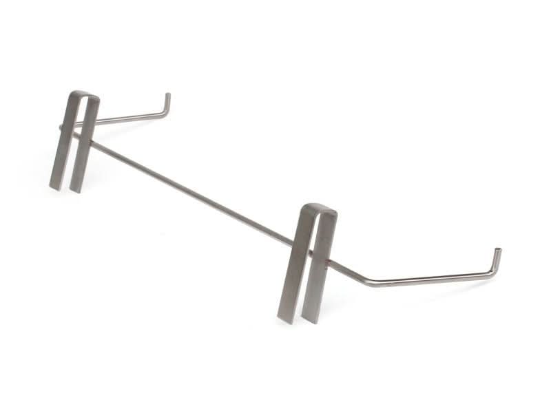 Stainless steel beehive frame holder hooked over a hive wall holding three frames