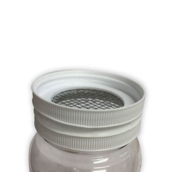 Double jar Varroa mite test with screened lid separating bees from mites