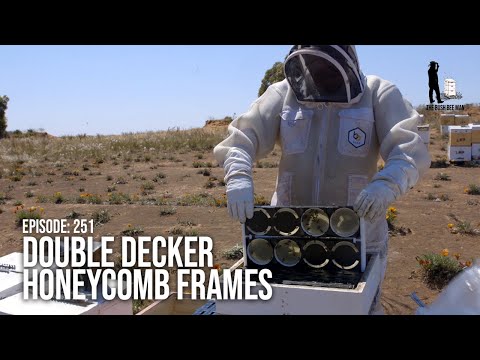 Man setting up Honey Supers with Double Decker Round Comb Frames