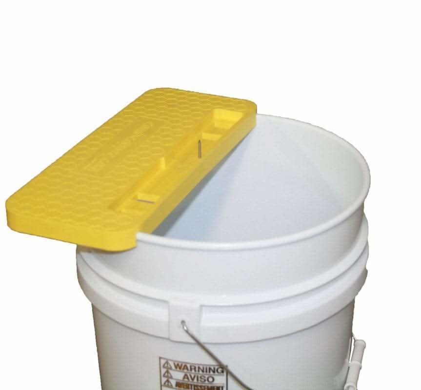 Portable uncapping bench stainless nail and predrilled pivot hole detail