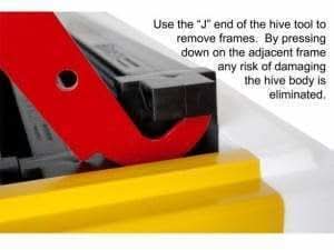 Red-handle J-hook hive tool, full side view